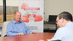 A two men at conference table