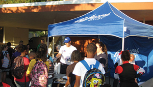 Marketing tent with students