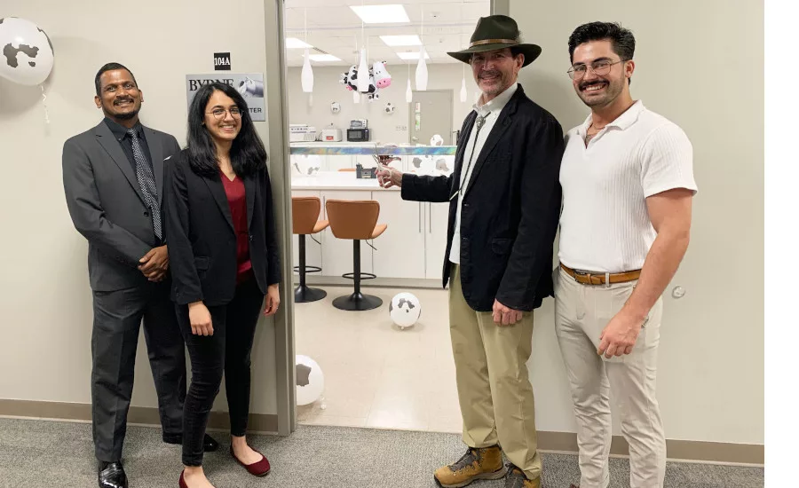 Byrne R&D ribbon cutting with Carl.jpg