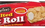 A candy bar promotes its protein content. Milk processors should put milk's protein content on bottle caps writes Mark Farmer in Dairy Foods
