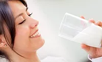 TetraPak woman with a milk glass TetraPak Chris Gretchko guest blog