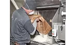 Flexicon-Franklin-Farms-East-Dairy-Foods-case-study-powder-in-hopper.png