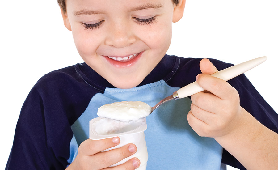 kid eating yogurtl