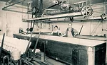 Frank Baker, founder of Baker Cheese, poses with his wife Marguerite in the Baker Cheese plant. Photo courtesy of Baker Cheese.