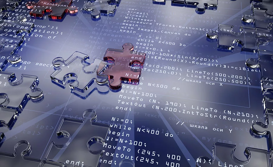 code and puzzle pieces on top