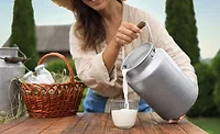 woman pouring milk woman pouring milk