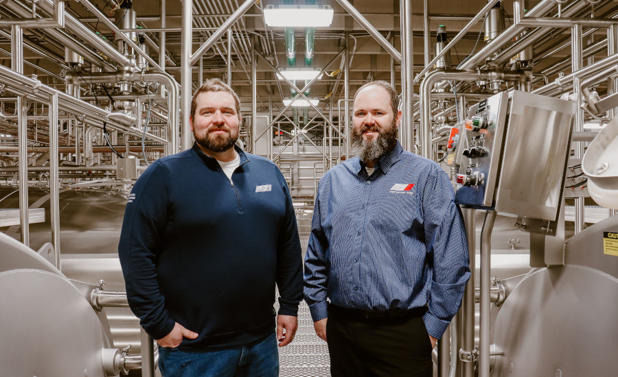 Cheese Plant Manager Zac McCann, left, and Director of Manufacturing Shane Dill