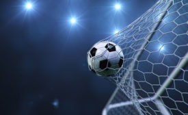 soccer ball inside the net