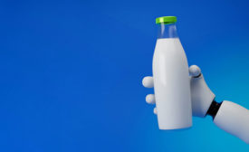 robot holding bottle of milk