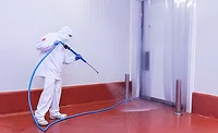 man sanitizing a room man sanitizing a room
