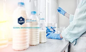 three bottles of milk and lab workers