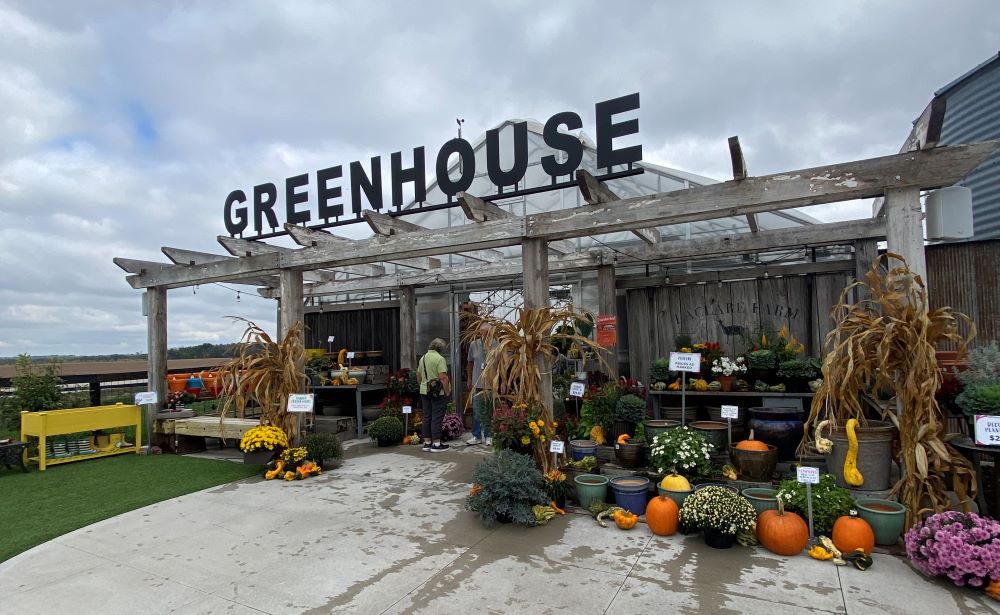 Depending on the season, the Greenhouse features fresh foliage, a kids' potting station, candles, gifts and more.
