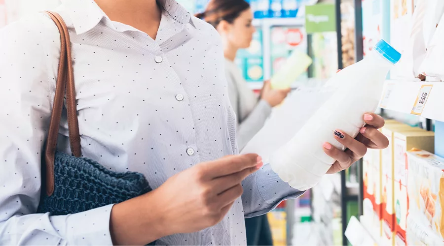 woman shopping for milk