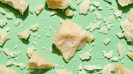 a block of Parmesan cheese