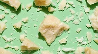 a block of Parmesan cheese a block of Parmesan cheese
