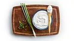 a container of Emborg Sour Cream