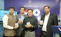 Coke India Vio executives Coca-Cola India launches Vio milk in India