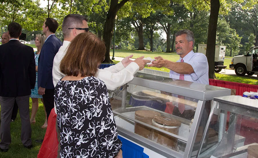Brian-Perry-Perrys-Ice-Cream-hones-his-scooping-skills.jpg