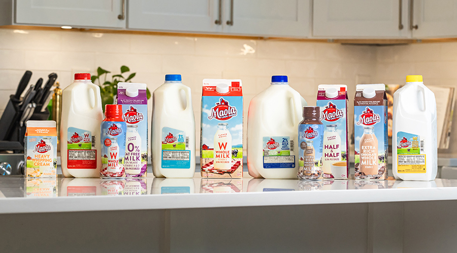 Maola Local Dairies brands of milk products on a kitchen counter.