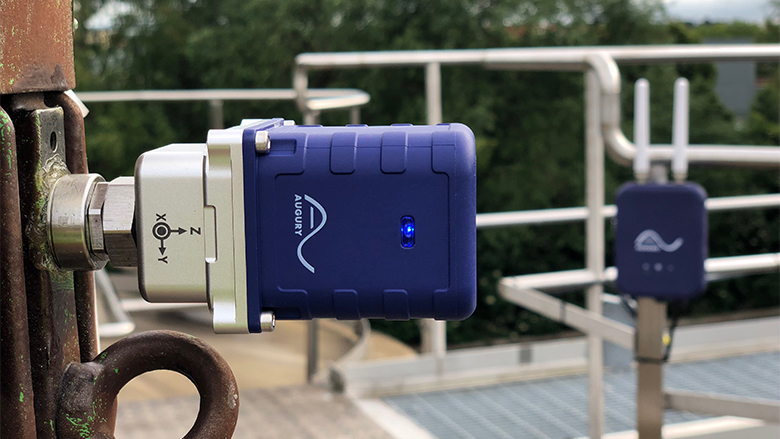 Augury's sensors and node at work in an outdoor industrial environment.