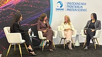 Takoua Debeche, Dr. Katrien Van Laere, Dr. Shawn Hueglin, and Dr. Susan Zaripheh speak during the 'Unlocking New Frontiers in Protein Science' event From left to right, Takoua Debeche, Dr. Katrien Van Laere, Dr. Shawn Hueglin, and Dr. Susan Zaripheh speak during the "Unlocking New Frontiers in Protein Science" event in Louisville, Colorado.
