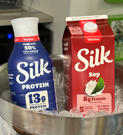 Silk Protein and Silk Soy cartons in a bowl of ice.