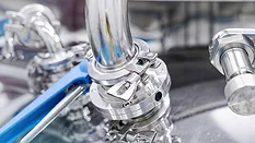 Close up of dairy processing equipment.