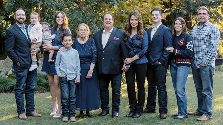 The Gallo family posing for a group picture outside. The Gallo family includes, l. to r., Peter Gallo and children, wife Lindsi, Mrs. Joseph Gallo, Mike Gallo, CEO, wife Lori, Marco Gallo, Tiffanie Gallo, and Micah Gallo.