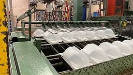 Rows of gallon jugs being produced in-house at Maola.