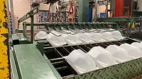 Rows of gallon jugs being produced in-house at Maola.