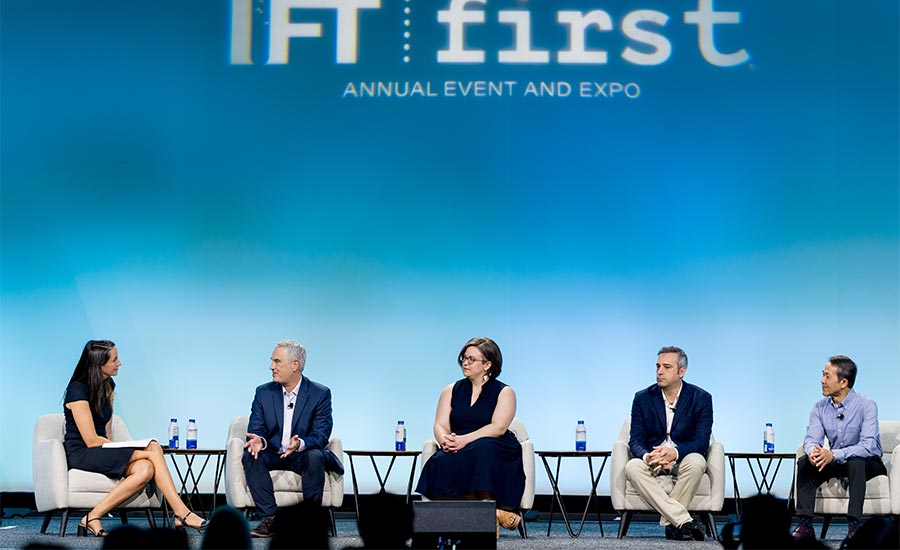 Five speakers on stage at the first UPF Session.